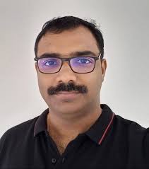 Dr Biju P